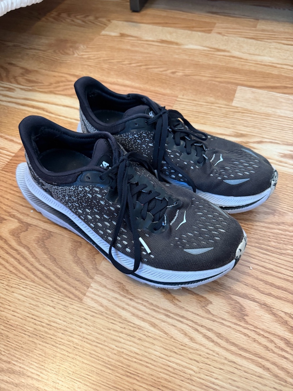 Woman’s Black Running Shoes with Cushioned White Midsole